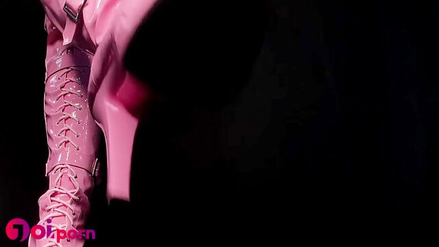 Brunette stroking her pink sexy latex boots - Princess Miki