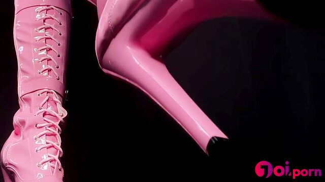 Brunette stroking her pink sexy latex boots - Princess Miki