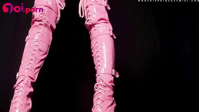 Brunette stroking her pink sexy latex boots - Princess Miki